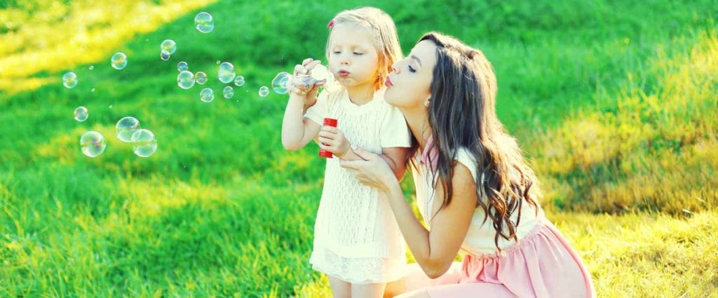 Childcare provider and children enjoying the sunshine in Palm Beach