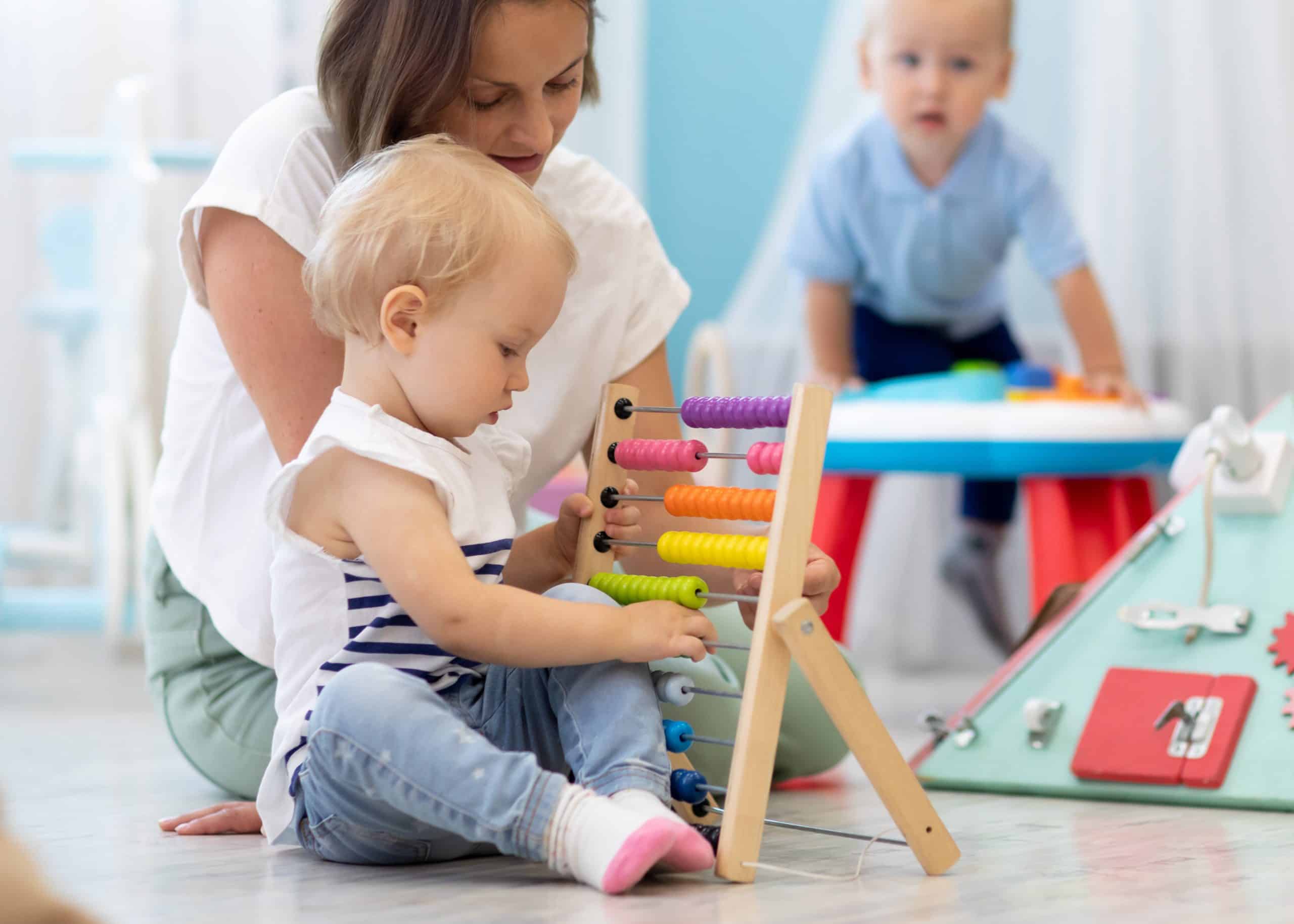 Professional nanny preparing healthy snacks for children in Coral Gables kitchen
